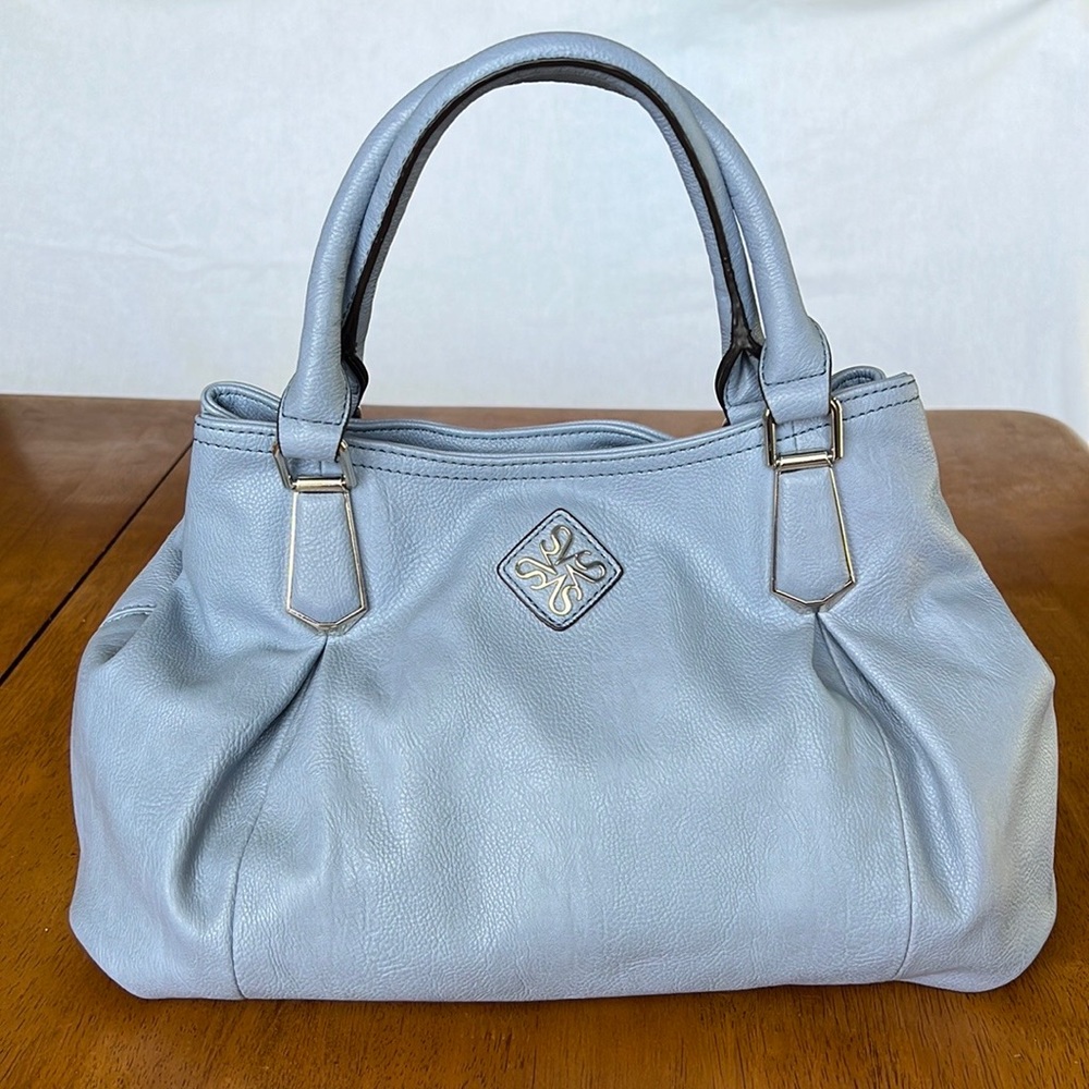 Simply Vera Wang light blue bag with silver hardware with many compartments